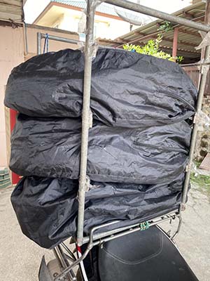 ภาพวางพวงหรีดบนรถมอเตอร์ไซด์