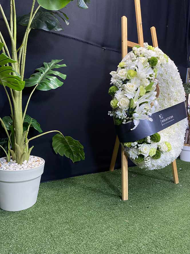 พวงหรีดดอกไม้สดราคา 1200 - 1600 ธารา 9248